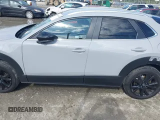2025 Mazda CX-30 S Select Sport z VIN 3MVDMBBM8SM758071, wystawiony jako IAAI lot #42007849 z przebiegiem 8 678 mil mil oraz . Historia ofert i sprzedaży dostępna na DreamBid. Obrazek 14.