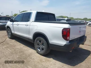 2023 Honda Ridgeline RTL z VIN 5FPYK3F51PB028295, wystawiony jako IAAI lot #42031783 z przebiegiem 39 228 mil mil oraz . Historia ofert i sprzedaży dostępna na DreamBid. Obrazek 3.
