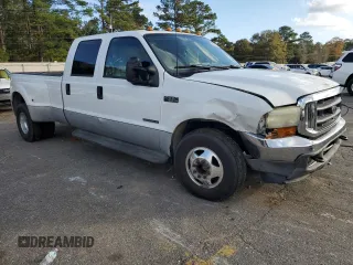 2001 Ford F-350 XL with VIN 1FTWW32F81ED76171, listed as a Copart auction lot 85030524 with 294,338 mi miles and Salvage title. Bid and sale history available at DreamBid. Image 4.