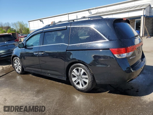 2014 Honda Odyssey Touring with VIN 5FNRL5H99EB088859, listed as a Copart auction lot 54828555 with 147,147 mi miles and Salvage Title. Bid and sale history available at DreamBid. Image 2.