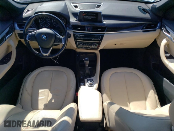 2016 BMW X1 xDrive28i z VIN WBXHT3C3XGP888701, wystawiony jako Copart lot #51409205 z przebiegiem 94 713 mil mil oraz Szkoda całkowita • Salvage title. Historia ofert i sprzedaży dostępna na DreamBid. Obrazek 8.