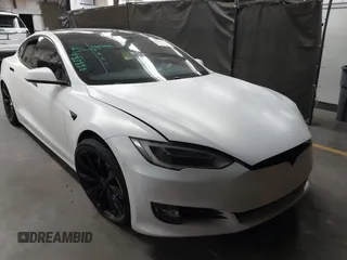 2017 Tesla Model S 100D with VIN 5YJSA1E2XHF224671, listed as a IAAI auction lot 42665581 with 128,517 mi miles and . Bid and sale history available at DreamBid. Image 1.
