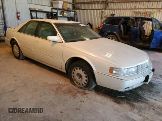 1993 Cadillac Seville Touring STS z VIN 1G6KY5295PU817593, wystawiony jako Copart lot #47807075 z przebiegiem Nie podano mil oraz Czysty tytuł • Clean title. Historia ofert i sprzedaży dostępna na DreamBid. Obrazek 4.