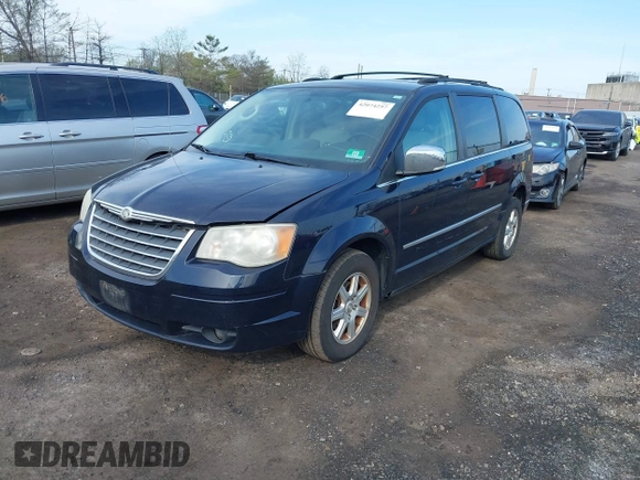 2010 Chrysler Town & Country Touring Plus with VIN 2A4RR8D1XAR480600, listed as a IAAI auction lot 42074257 with 195,154 mi miles and . Bid and sale history available at DreamBid. Image 2.