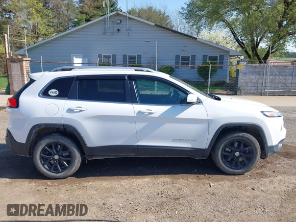 2015 Jeep Cherokee Latitude with VIN 1C4PJMCS0FW790017, listed as a IAAI auction lot 42097988 with 105,990 mi miles and . Bid and sale history available at DreamBid. Image 13.