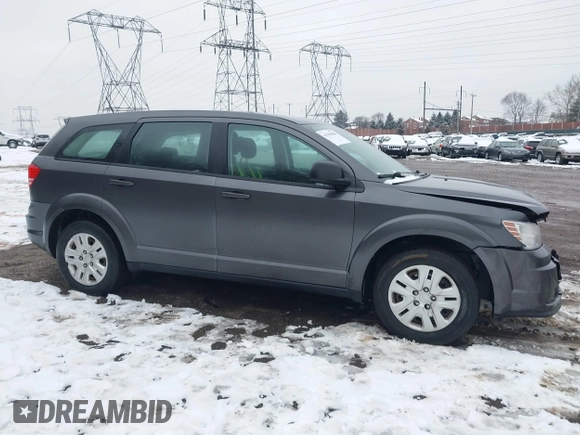 2014 Dodge Journey SE with VIN 3C4PDCAB0ET182376, listed as a IAAI auction lot 41569006 with 106,024 mi miles and . Bid and sale history available at DreamBid. Image 1.