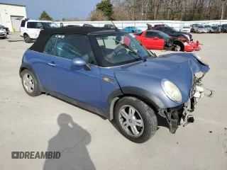 2005 MINI Convertible with VIN WMWRF33555TF62593, listed as a Copart auction lot 48305985 with 172,839 mi miles and Salvage title. Bid and sale history available at DreamBid. Image 4.