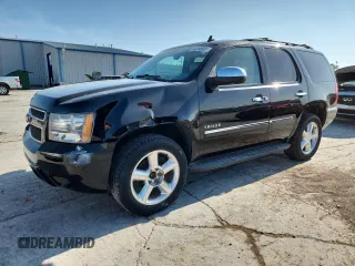 2014 Chevrolet Tahoe LTZ с VIN 1GNSKCE09ER116627, выставлен на аукционе Copart как лот 64214685 с пробегом 240 970 миль миль и Чистый • Clean title. История ставок и продаж доступна на DreamBid. Изображение 1.
