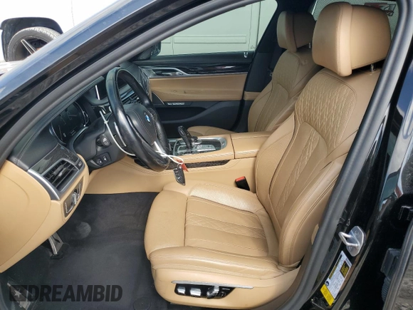 2017 BMW 7 Series 740i with VIN WBA7E2C34HG741026, listed as a Copart auction lot 52792995 with 91,462 mi miles and Salvage Title. Bid and sale history available at carsss.com. Image 7.