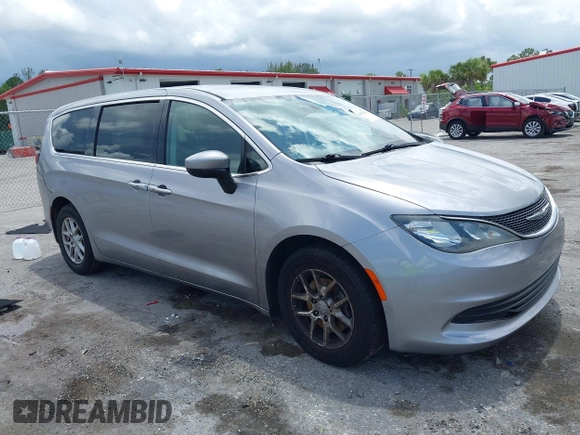 2017 Chrysler Pacifica Touring with VIN 2C4RC1DG7HR516711, listed as a IAAI auction lot 42633544 with 97,853 mi miles and . Bid and sale history available at DreamBid. Image 1.