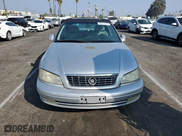 2000 Cadillac Catera z VIN W06VR54R1YR003905, wystawiony jako Copart lot #76417144 z przebiegiem 80 894 mil mil oraz Czysty tytuł • Clean title. Historia ofert i sprzedaży dostępna na DreamBid. Obrazek 5.