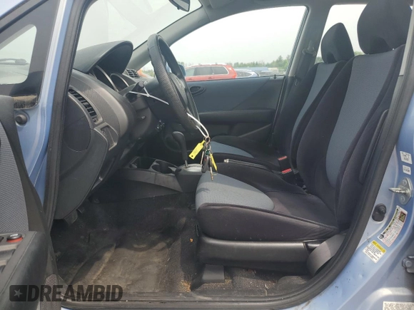2008 Honda Fit with VIN JHMGD38478S062828, listed as a Copart auction lot 61035585 with 169,271 mi miles and Salvage title. Bid and sale history available at DreamBid. Image 7.
