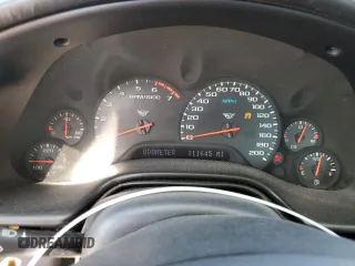 2000 Chevrolet Corvette with VIN 1G1YY22G7Y5112660, listed as a Copart auction lot 77734324 with 111,645 mi miles and Salvage Title. Bid and sale history available at carsss.com. Image 9.