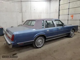 1988 Lincoln Town Car with VIN 1LNBM81F2JY754921, listed as a Copart auction lot 76236564 with 593,215 mi miles and Salvage Title. Bid and sale history available at carsss.com. Image 3.
