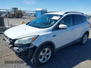 2016 Ford Escape SE with VIN 1FMCU9G95GUC63027, listed as a IAAI auction lot 41838955 with 95,283 mi miles. Bid and sale history available at carsss.com. Image 2.