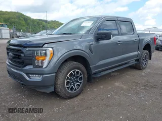 2021 Ford F-150 XL with VIN 1FTFW1E56MKE74015, listed as a IAAI auction lot 42172934 with 27,186 mi miles and . Bid and sale history available at DreamBid. Image 2.