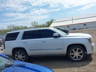 2016 Cadillac Escalade Platinum z VIN 1GYS4DKJ6GR368113, wystawiony jako IAAI lot #42115887 z przebiegiem 113 777 mil mil oraz . Historia ofert i sprzedaży dostępna na DreamBid. Obrazek 13.
