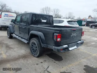 2023 Jeep Gladiator Overland with VIN 1C6HJTFG4PL564093, listed as a IAAI auction lot 41594203 with 37,740 mi miles. Bid and sale history available at carsss.com. Image 3.