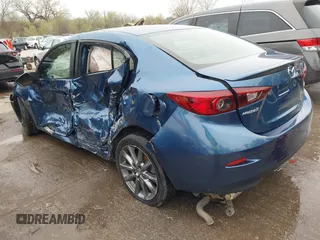 2018 Mazda 3 Touring with VIN 3MZBN1V35JM217641, listed as a IAAI auction lot 41943433 with 64,884 mi miles. Bid and sale history available at carsss.com. Image 3.