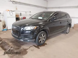 2013 Audi Q7 3.0T Premium Plus with VIN WA1LGAFE6DD000112, listed as a IAAI auction lot 41229774 with 149,122 mi miles. Bid and sale history available at carsss.com. Image 2.