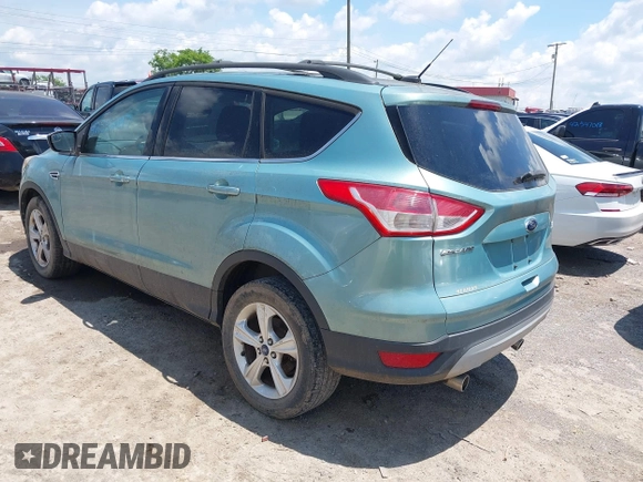 2013 Ford Escape SE z VIN 1FMCU0GX0DUA90717, wystawiony jako IAAI lot #42558297 z przebiegiem 122 785 mil mil oraz . Historia ofert i sprzedaży dostępna na DreamBid. Obrazek 3.