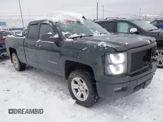 2015 Chevrolet Silverado 1500 LT with VIN 1GCVKREC9FZ382895, listed as a IAAI auction lot 40976186 with 142,998 mi miles. Bid and sale history available at carsss.com. Image 1.