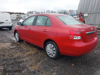 2009 Toyota Yaris with VIN JTDBT903491326454, listed as a IAAI auction lot 41985429 with NaN miles. Bid and sale history available at carsss.com. Image 3.