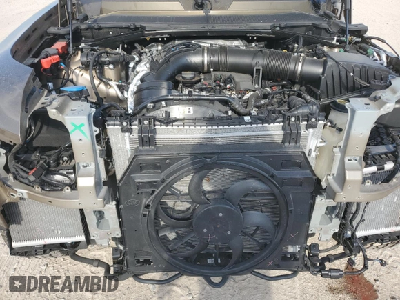 2024 Land Rover Defender S with VIN SALEJ7EU2R2272955, listed as a Copart auction lot 66796994 with 9,079 mi miles and Salvage title. Bid and sale history available at DreamBid. Image 12.