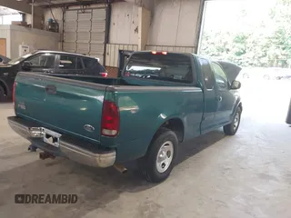 2000 Ford F-150 XL with VIN 1FTRX17L7YNA66620, listed as a IAAI auction lot 42622639 with Not provided miles and . Bid and sale history available at DreamBid. Image 4.