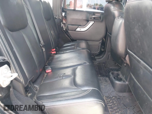 2015 Jeep Wrangler Unlimited Sahara with VIN 1C4HJWEG6FL572674, listed as a IAAI auction lot 42736266 with 97,024 mi miles and . Bid and sale history available at DreamBid. Image 8.