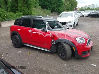 2020 MINI Countryman Cooper S z VIN WMZYX1C09L3L58197, wystawiony jako IAAI lot #42303609 z przebiegiem Nie podano mil oraz . Historia ofert i sprzedaży dostępna na DreamBid. Obrazek 13.