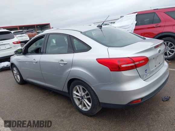2015 Ford Focus SE with VIN 1FADP3F26FL254588, listed as a IAAI auction lot 42146381 with 99,280 mi miles and . Bid and sale history available at DreamBid. Image 14.