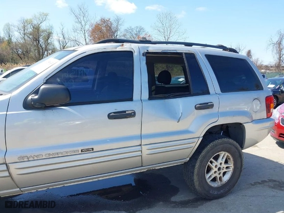 2004 Jeep Grand Cherokee Laredo with VIN 1J4GW48N74C372583, listed as a IAAI auction lot 41915693 with 154,273 mi miles. Bid and sale history available at carsss.com. Image 6.