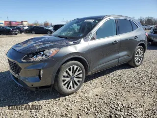 2020 Ford Escape Titanium Hybrid z VIN 1FMCU9DZ0LUC11478, wystawiony jako Copart lot #50552275 z przebiegiem 105 561 mil mil oraz Szkoda całkowita • Salvage title. Historia ofert i sprzedaży dostępna na DreamBid. Obrazek 1.