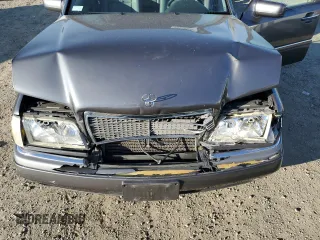 1997 Mercedes-Benz C with VIN WDBHA23E7VF545229, listed as a Copart auction lot 43518335 with 153,158 mi miles and Salvage title. Bid and sale history available at DreamBid. Image 11.