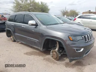 2017 Jeep Grand Cherokee Limited with VIN 1C4RJEBG4HC838019, listed as a IAAI auction lot 41804665 with 135,980 mi miles. Bid and sale history available at carsss.com. Image 1.