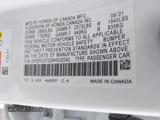 2022 Honda Civic Sedan Sport with VIN 2HGFE2F52NH532042, listed as a IAAI auction lot 41594967 with 76,809 mi miles. Bid and sale history available at carsss.com. Image 9.