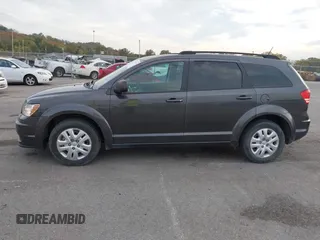2018 Dodge Journey SE with VIN 3C4PDCABXJT170150, listed as a IAAI auction lot 40715756 with 113,330 mi miles and . Bid and sale history available at DreamBid. Image 14.