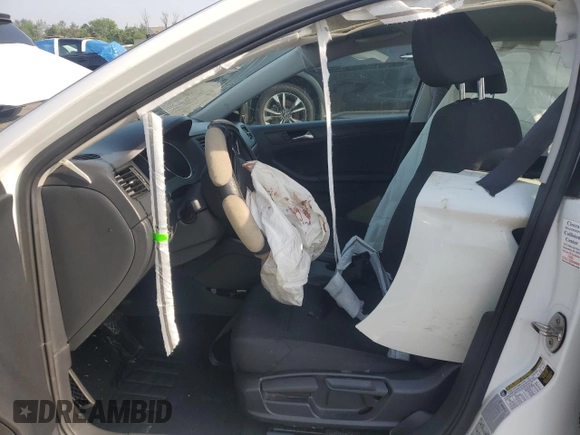 2015 Volkswagen Jetta S z VIN 3VW2K7AJ2FM309510, wystawiony jako Copart lot #60823955 z przebiegiem Nie podano mil oraz Szkoda całkowita • Salvage title. Historia ofert i sprzedaży dostępna na DreamBid. Obrazek 7.