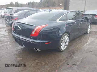 2015 Jaguar XJ Portfolio with VIN SAJWJ2GD0F8V83497, listed as a IAAI auction lot 41697285 with 52,311 mi miles and . Bid and sale history available at DreamBid. Image 4.