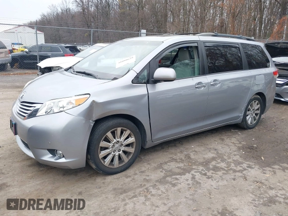 2012 Toyota Sienna XLE with VIN 5TDDK3DC7CS037579, listed as a IAAI auction lot 41080620 with 158,843 mi miles. Bid and sale history available at carsss.com. Image 2.