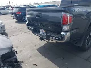2023 Toyota Tacoma SR with VIN 3TMCZ5AN0PM635933, listed as a IAAI auction lot 42543126 with 32,960 mi miles and . Bid and sale history available at DreamBid. Image 17.