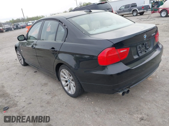 2011 BMW 3 Series 328i xDrive with VIN WBAPK7C55BA818598, listed as a IAAI auction lot 41968173 with 165,683 mi miles. Bid and sale history available at carsss.com. Image 3.