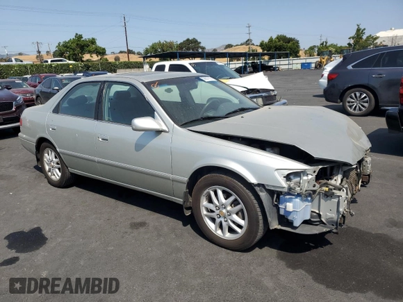 2000 Toyota Camry LE z VIN JT2BF28K5Y0261315, wystawiony jako Copart lot #59607935 z przebiegiem 87 184 mil mil oraz Szkoda całkowita • Salvage title. Historia ofert i sprzedaży dostępna na DreamBid. Obrazek 4.