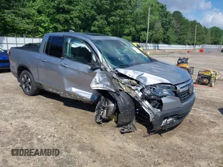 2020 Honda Ridgeline RTL with VIN 5FPYK3F5XLB025857, listed as a IAAI auction lot 42307343 with 97,262 mi miles and . Bid and sale history available at DreamBid. Image 1.