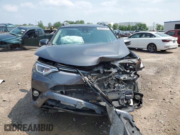 2016 Toyota RAV4 Limited z VIN JTMDFREV4GJ092789, wystawiony jako Copart lot #60430715 z przebiegiem Nie podano mil oraz Szkoda całkowita • Salvage title. Historia ofert i sprzedaży dostępna na DreamBid. Obrazek 5.