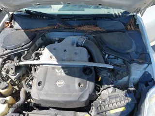 2006 Nissan 350Z Touring with VIN JN1AZ36A96M452478, listed as a IAAI auction lot 41843993 with 211,567 mi miles. Bid and sale history available at carsss.com. Image 10.