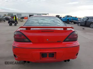 2004 Pontiac Grand Am z VIN 1G2NV12EX4M641018, wystawiony jako IAAI lot #41255352 z przebiegiem 144 385 mil mil oraz . Historia ofert i sprzedaży dostępna na DreamBid. Obrazek 17.