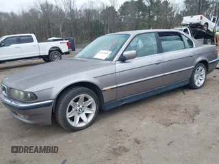 1998 BMW 7 Series 740il with VIN WBAGJ8323WDM23239, listed as a IAAI auction lot 41512630 with 221,673 mi miles. Bid and sale history available at carsss.com. Image 18.