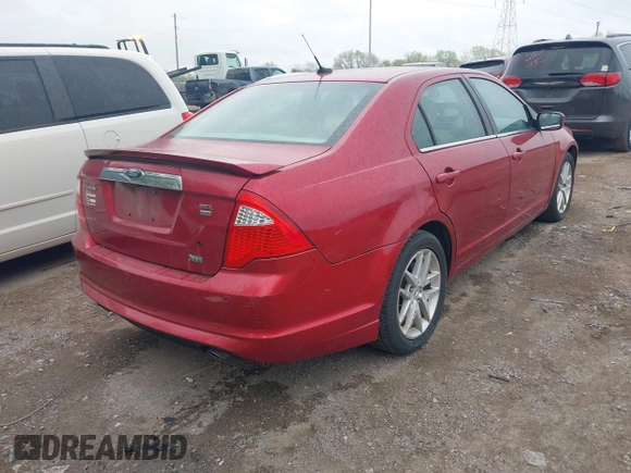 2010 Ford Fusion SEL with VIN 3FAHP0CG3AR421256, listed as a IAAI auction lot 42088731 with 147,082 mi miles. Bid and sale history available at carsss.com. Image 4.